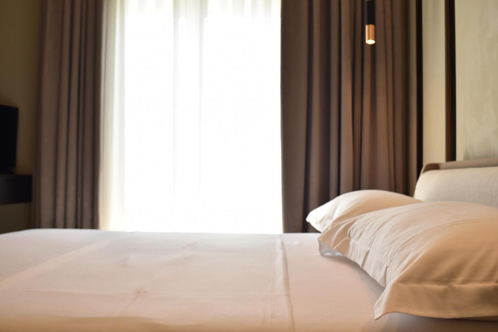 Nuna Hotel Radhime Phòng bức ảnh